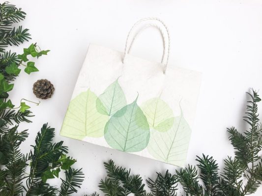 Handcrafted gift bag for Christmas - Green leaves