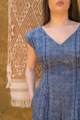 Woman wearing indigo batik pattern short jumpsuit