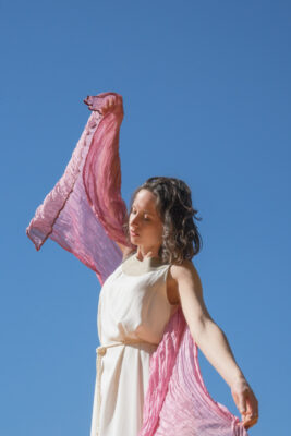 Woman wearing pink handmade organza silk scarf